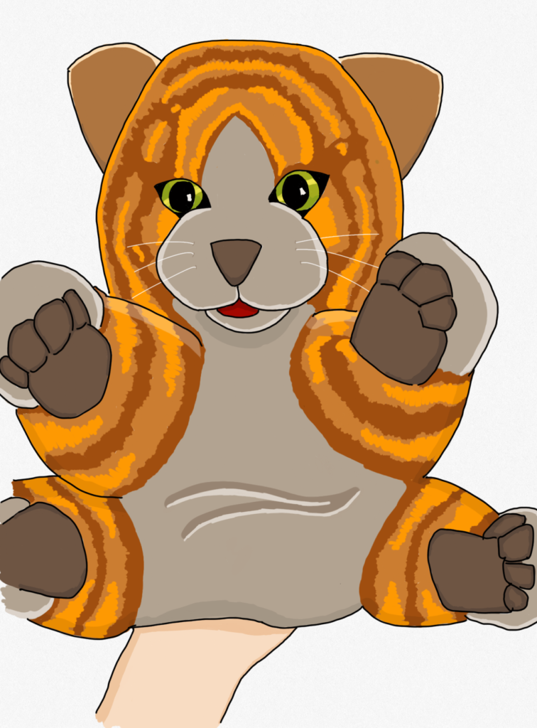 Image showing a toy orange tabby stuffed cat puppet on a hand.