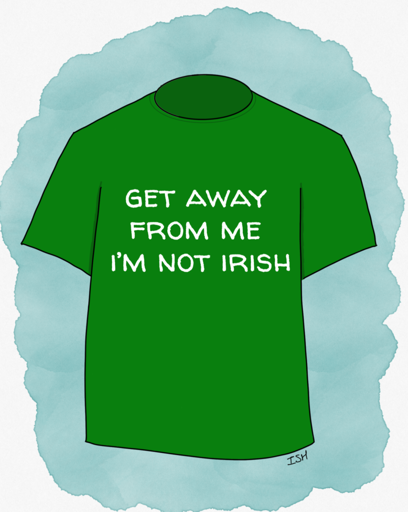 Image of a green T-shirt with a slogan on it. The slogan says "Get away from me, I'm not Irish"
